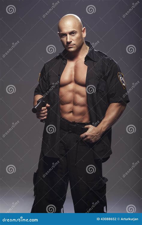 muscle cop|Muscular Policeman Stock Photos, Images & Pictures .